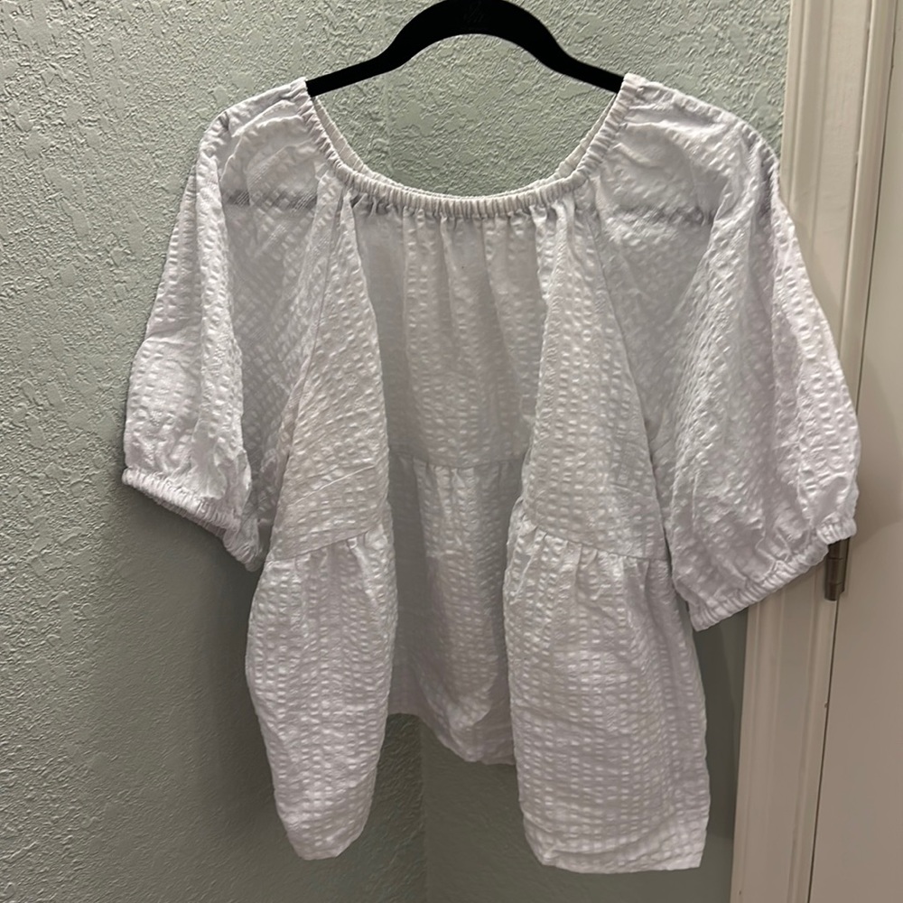 Crisp white peplum short sleeve blouse from Old Navy